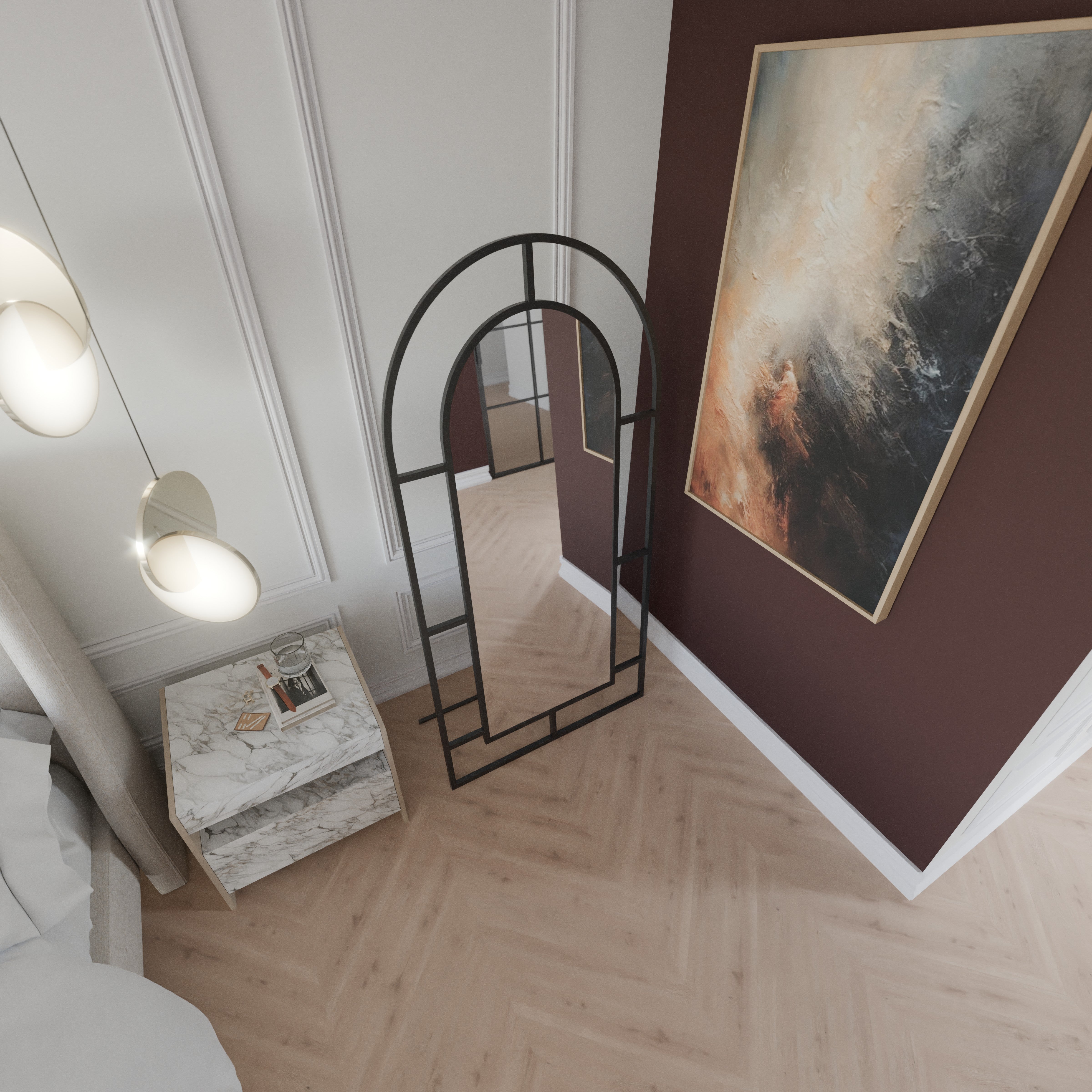 Bellator freistehender Ganzkörperspiegel mit schwarzem Metallrahmen in Bogenform und Streben-Design, schräg von oben im Schlafzimmer fotografiert.